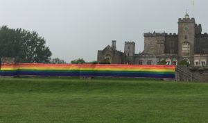 LGBT banner spanning in front of a manor house
